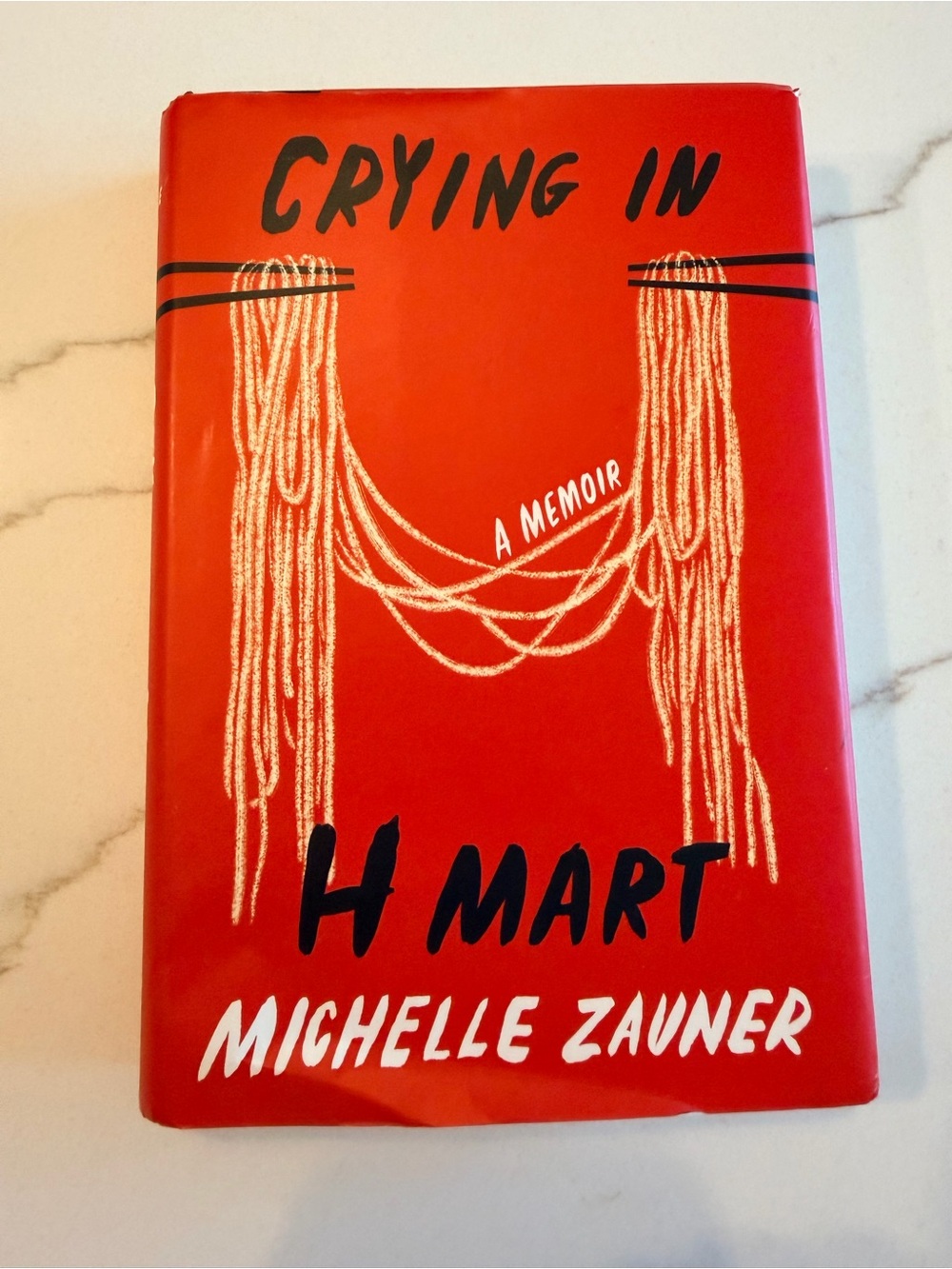 Crying in H Mart by Michelle Zauner - Red Hardcover Memoir